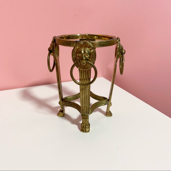Vintage lion head stand